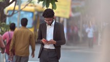 Indian businessman on the phone in Kolkata, India.