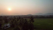 Sun rising in the rice fields of Vizag Visakhapatnam, India