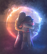 A father and son hugging and surrounded by colorful lights