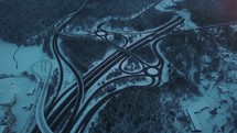 aerial view over highways in snow 