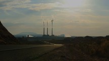 3 smoke stacks from a large power plant