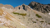 Panorama of rocky alps mountains valley in sunny morning nature tourism background
