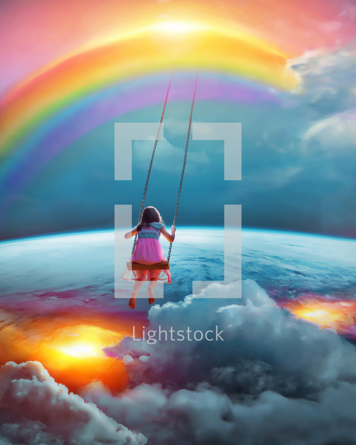 A young girl swings happily on a rainbow across the earth