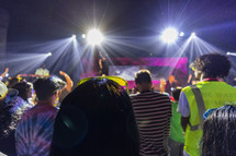 Youth worshiping during a young people's gathering
