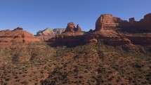 Aerial pullback of red rock sandstone formations in the American southwest