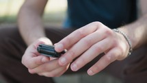 Young Boy Sends Messages On A Vintage Button Telephone