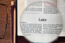 magnifying glass over Luke