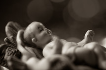 baby Jesus in a manger figurine 