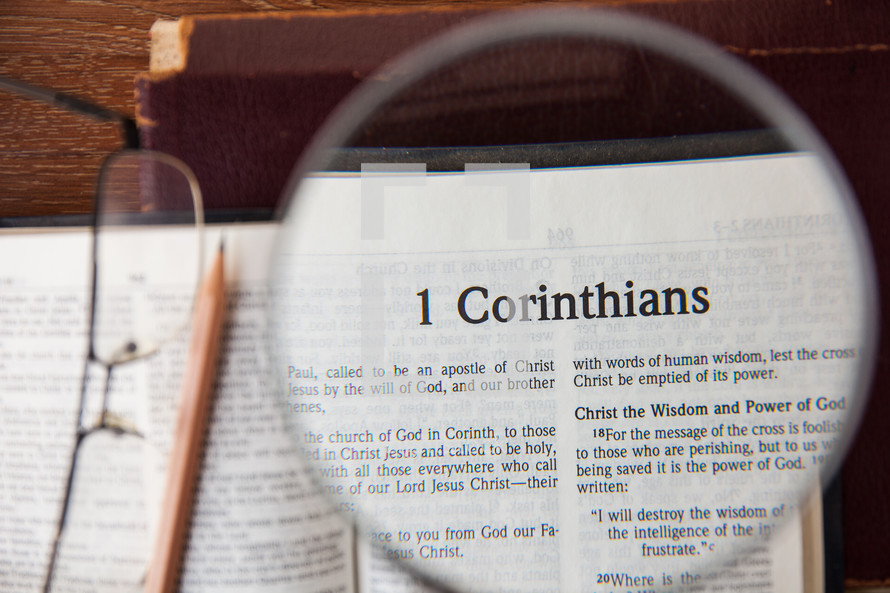 magnifying glass over 1 Corinthians 
