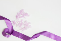purple flowers and purple ribbon 