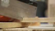 Carpenter cutting wood