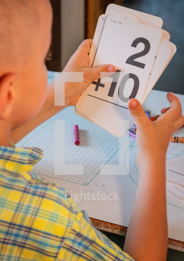 a child learning math with math flashcards 