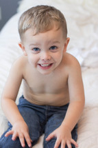 shirtless toddler boy