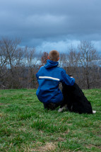 a boy with his dog 