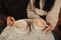 a couple having coffee together 