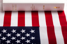 Holy Bible on an American flag 