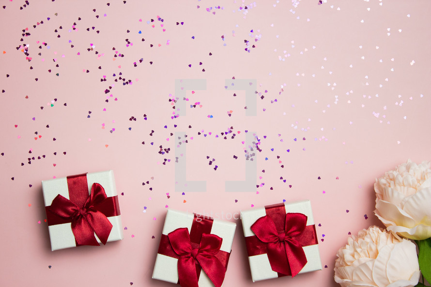 wrapped gifts on pink 