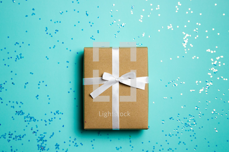 wrapped gift on turquoise 