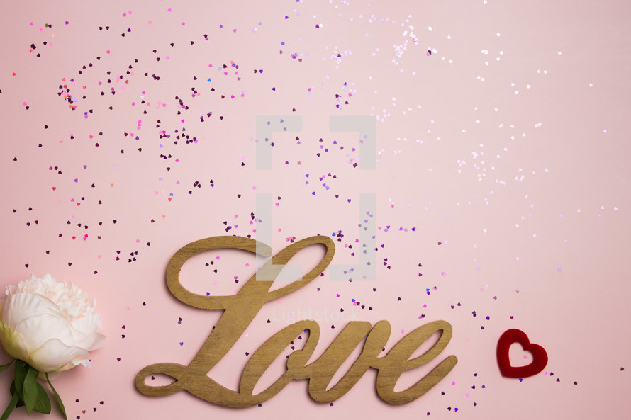 word love on a pink background 