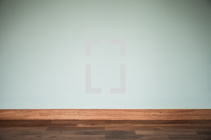wood floor and white wall 