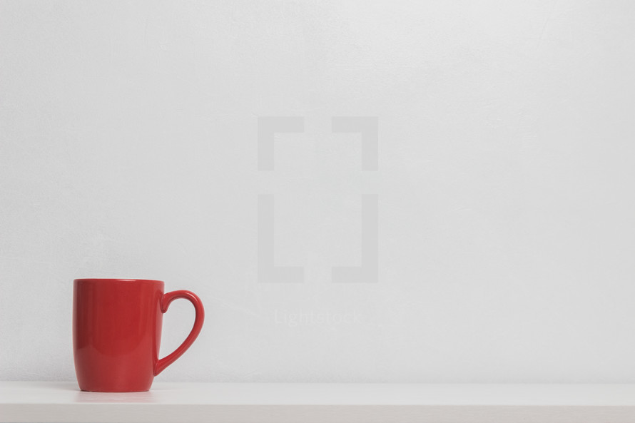 red mug on a white background 