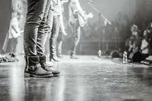 boots on stage at a concert 