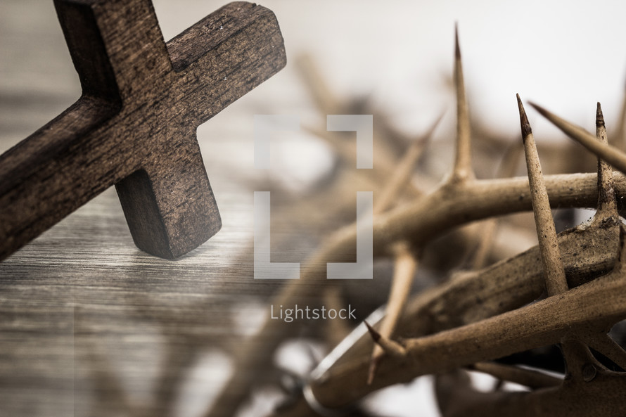 wood cross and crown of thorns 