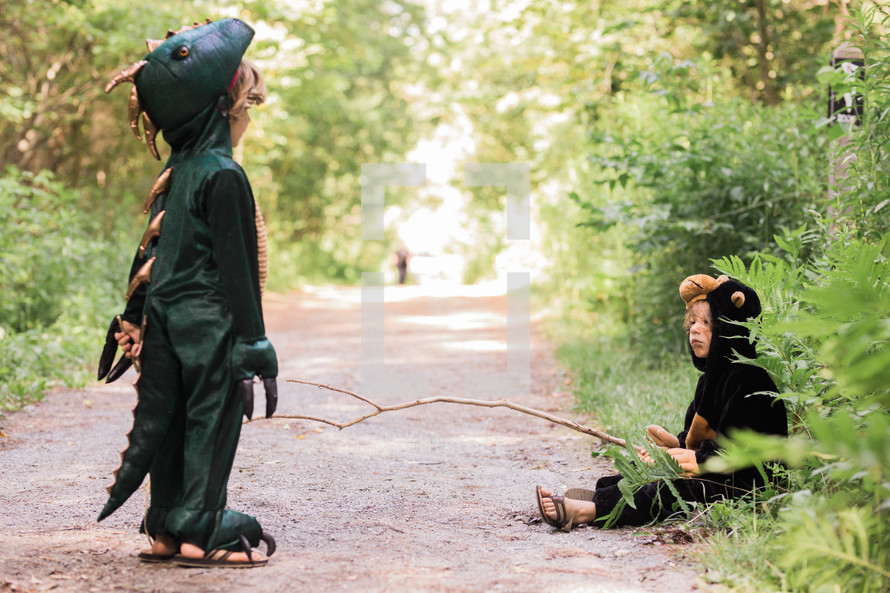 children in a dragon and monkey costume 
