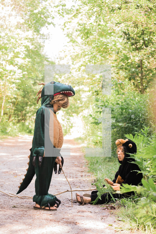 children in monkey and dragon costumes