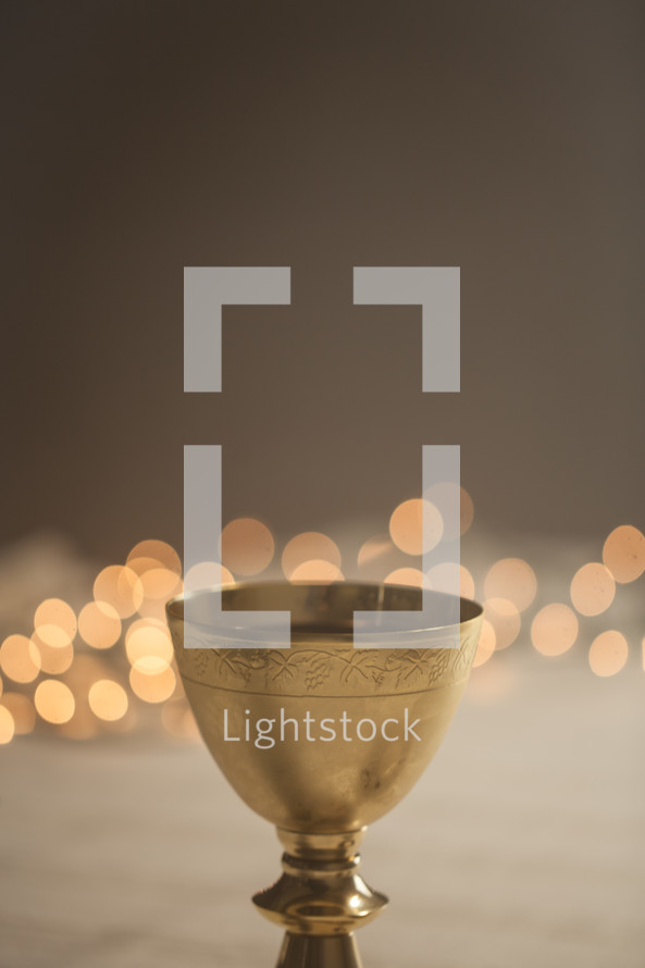 chalice with bokeh lights 