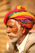 elderly man in a turban 