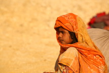refugee resting in the desert 