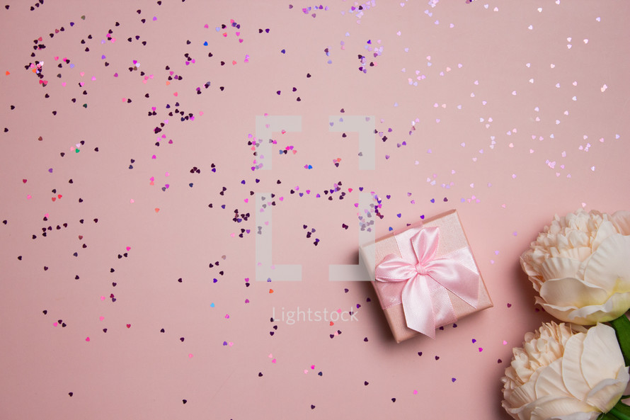 gifts on a pink background 