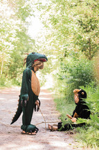 children in monkey and dragon costumes