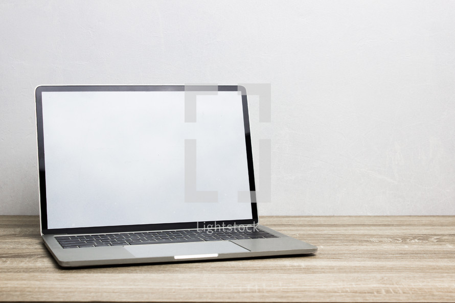 laptop computer screen on a desk 
