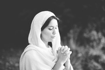 a woman praying in biblical times 
