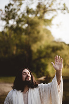 Jesus with hand raised 