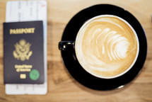 passport, plane ticket, and coffee 