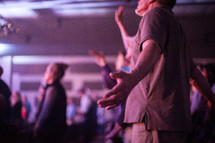 People worshipping at a church service.