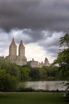 Tall buildings behind a pond in Central Park.