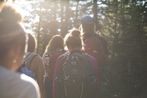 a group hiking in the woods 