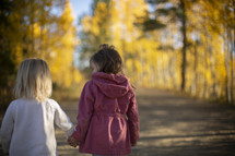 children walking outdoors in fall 