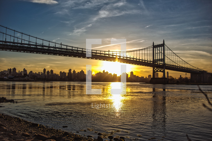 sunset behind Brooklyn bridge 