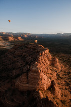hot air balloon over a canyon 