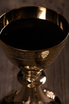 gold chalice of wine 