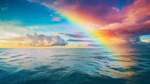 Rainbow in the sky over water. 