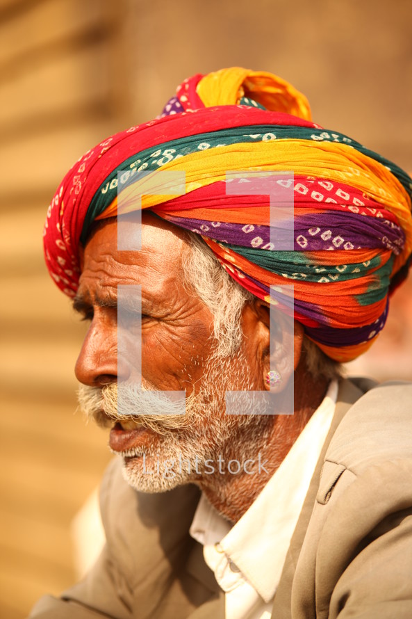 elderly man in a turban 