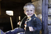 A smiling toddler boy. 