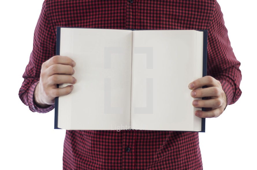 man holding a Book with blank pages 
