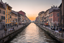 Canal and buildings at sunset